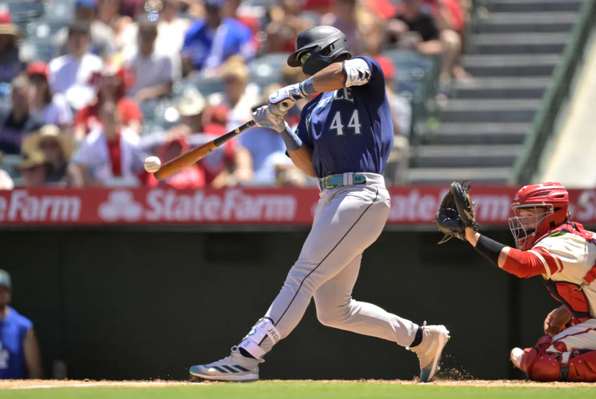 Julio Rodriguez (44) of the Seattle Mariners singles in the third inning against the Los Angeles Angels at Angel Stadium of Anaheim in Anaheim, Calif., on August 6, 2023. (Jayne Kamin-Oncea/Getty Images)