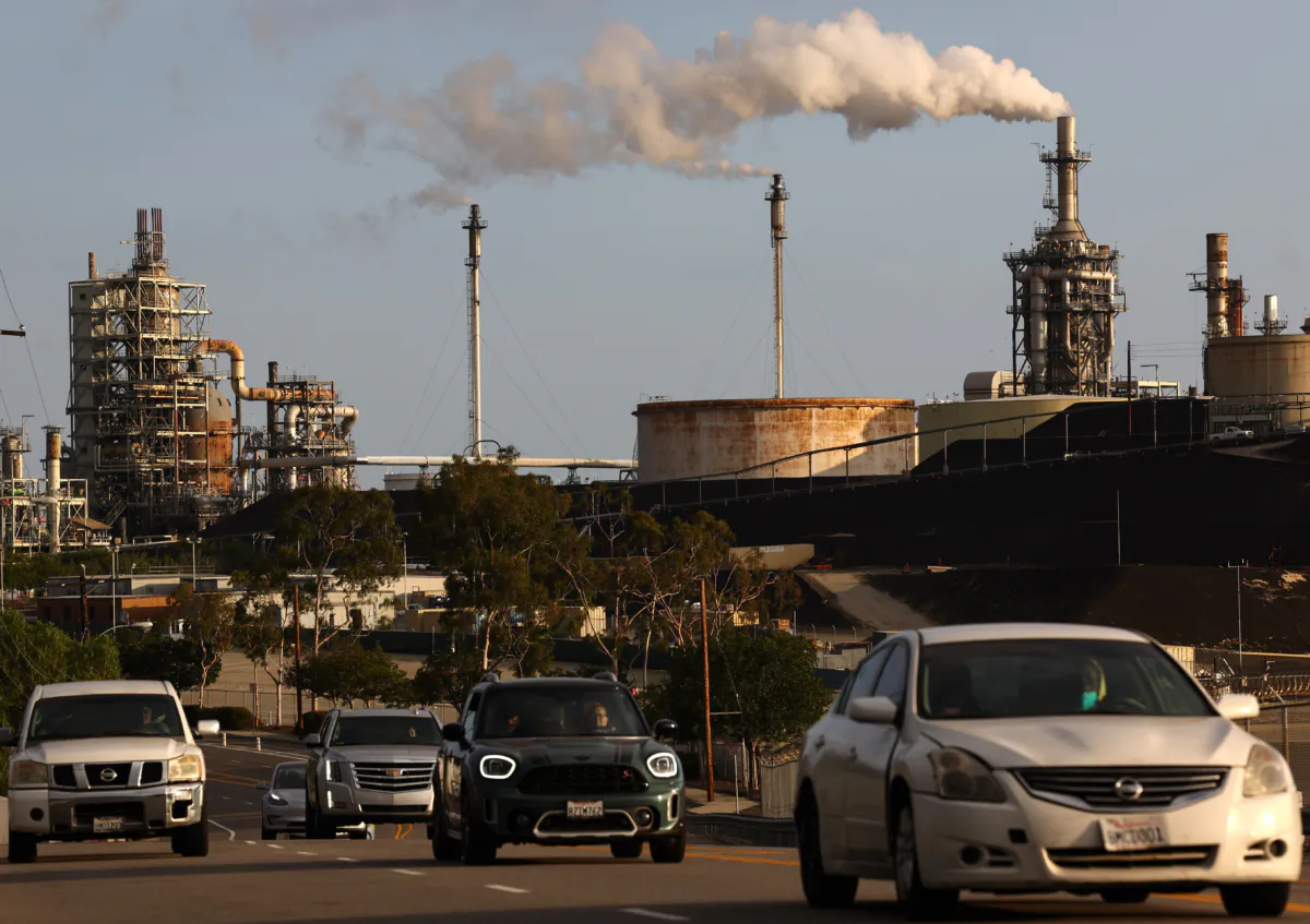 Vehicles pass the Phillips 66 Los Angeles Refinery's Wilmington plant on Nov. 28, 2022. (Mario Tama/Getty Images)