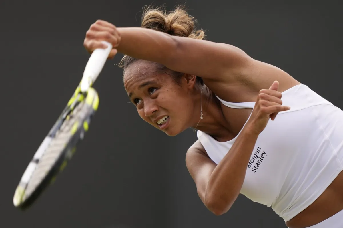 Canada's Leylah Fernandez returns to Caroline Garcia of France in a women's singles match on day four of the Wimbledon tennis championships in London, on July 6, 2023. (The Associated Press/Alberto Pezzali)