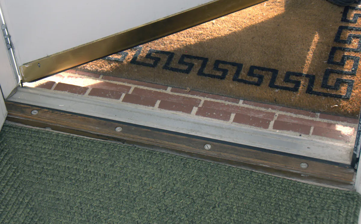 A door threshold is a simple aluminum strip with a vinyl insert in its center. (Gene Hamilton/TNS)