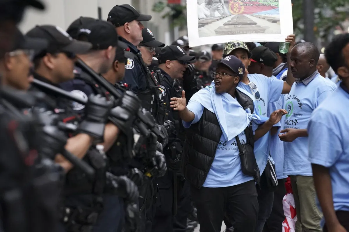 Toronto Police work the scene of a protest outside of the Sheraton Hotel in downtown Toronto, on Aug. 6 2023. (The Canadian Press/Arlyn McAdorey)

