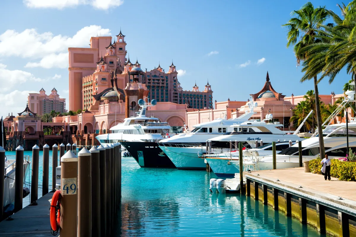At the Atlantis Paradise Island resort in Bahamas families can swim with the dolphins or register for Sea Squirts, an interactive marine program where youngsters can feed baby stingrays, sharks and schools of fish. (Dreamstime/TNS)
