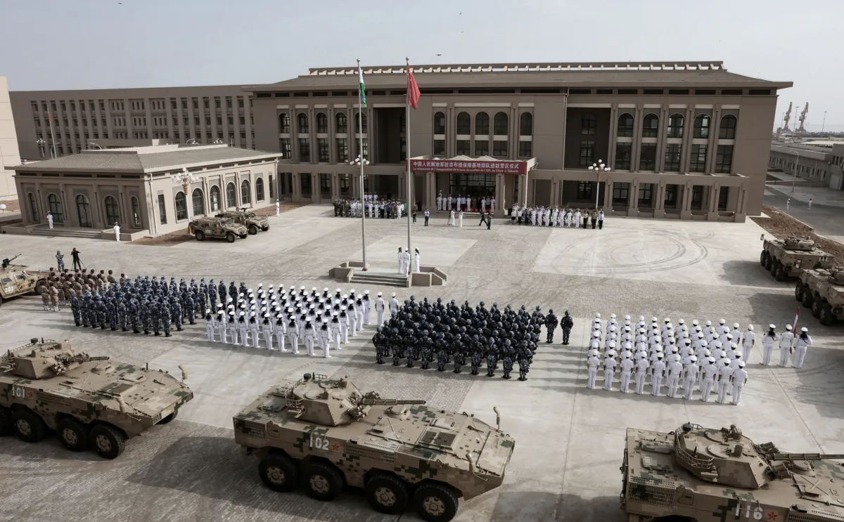Members of the Chinese People's Liberation Army attend the opening ceremony of China's military base in Djibouti. (STR/AFP via Getty Images)