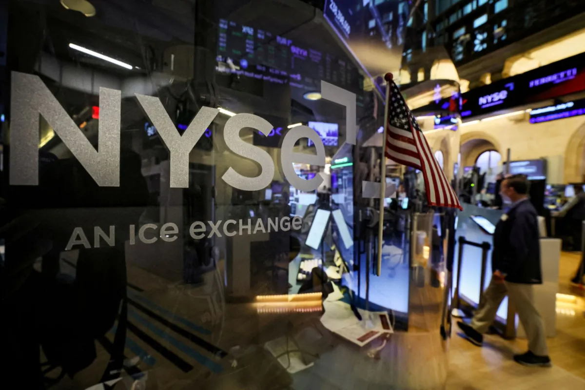 Traders work on the floor of the New York Stock Exchange (NYSE) in New York City on July 19, 2023. (Brendan McDermid/Reuters)