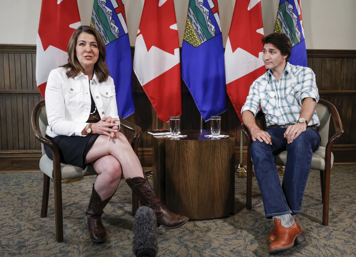 Prime Minister Justin Trudeau and Alberta Premier Danielle Smith meet in Calgary on July 7, 2023. (The Canadian Press/Jeff McIntosh)