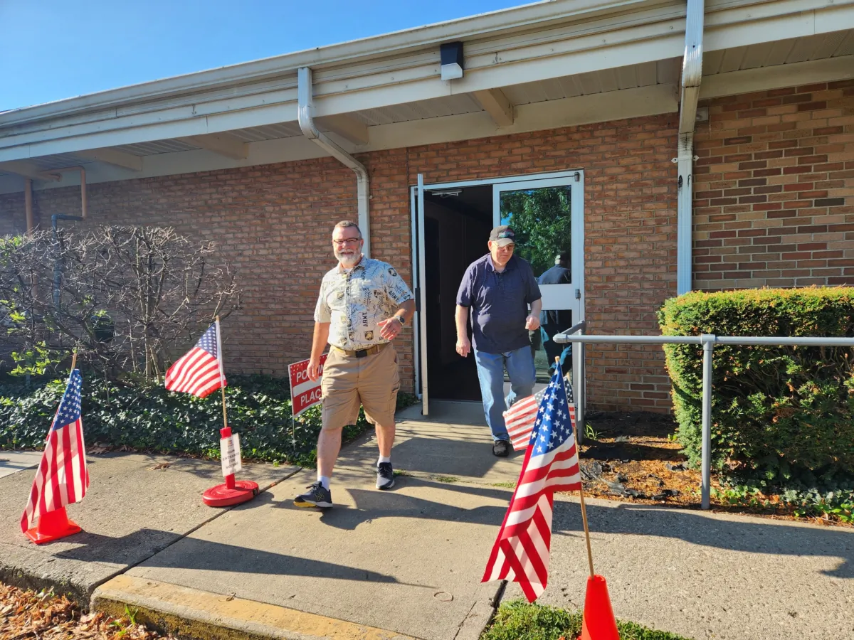 Voters exit a polling site in Kettering, Ohio, on Aug. 8, 2023. (Jeff Louderback/The Epoch Times)