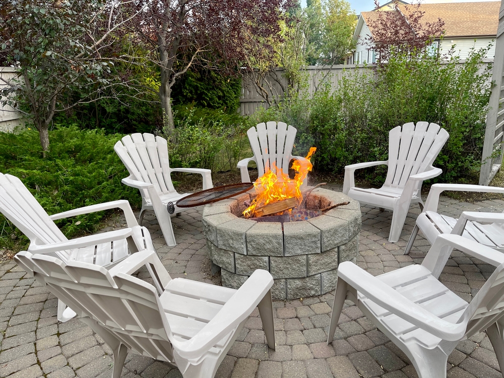 Fire In Fire Pit In The Backyard Of A Residence