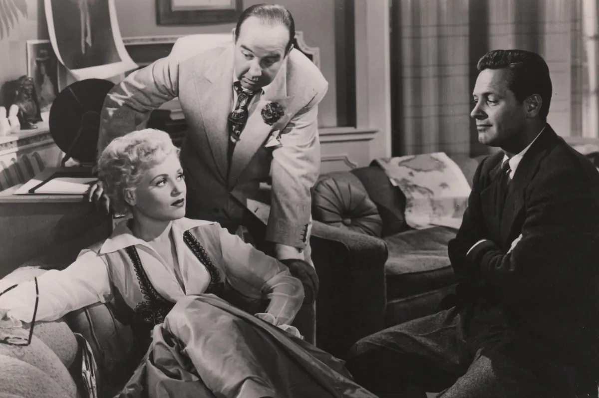 Cropped lobby card for the 1950 film "Born Yesterday." (MovieStillsDB)