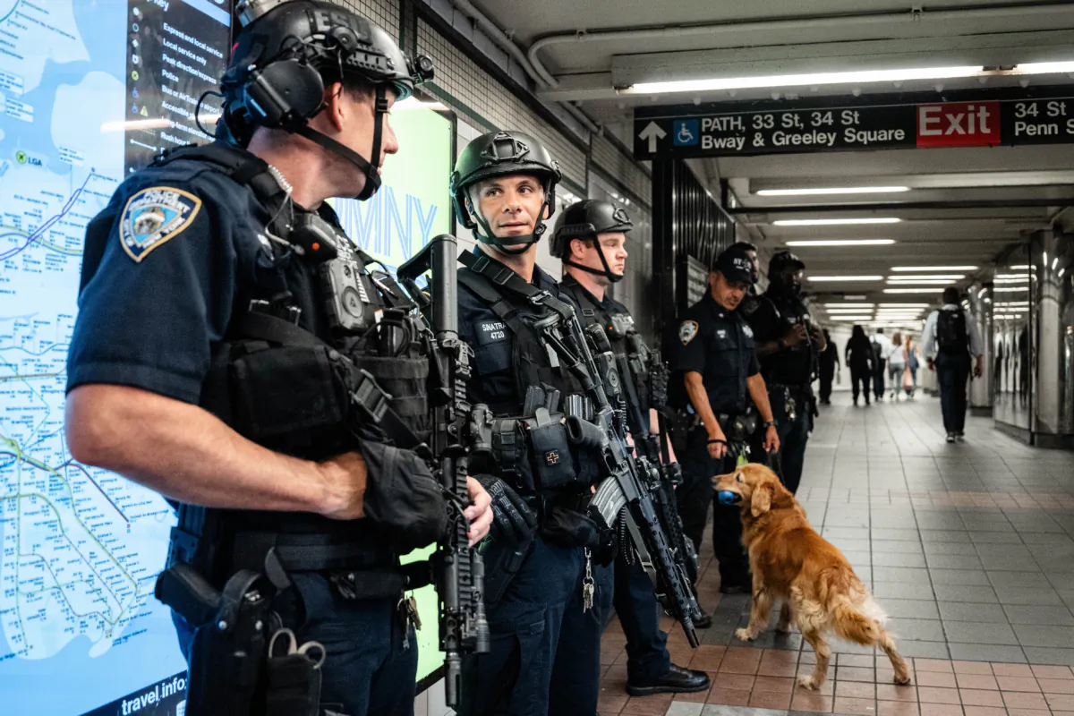 NYPD officers at Penn Station in New York on July 12, 2023. (Samira Bouaou/The Epoch Times)
