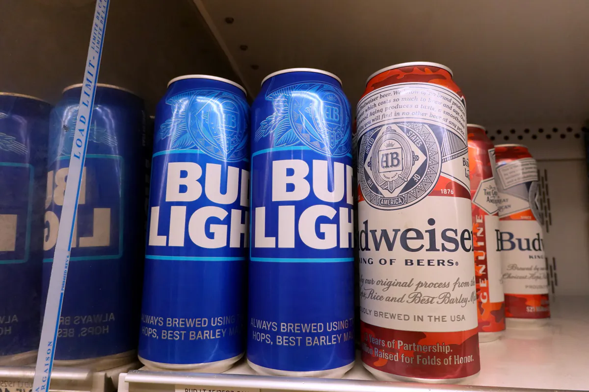 MIAMI, FLORIDA - JULY 27: Bud Light, made by Anheuser-Busch, sits on a store shelf on July 27, 2023 in Miami, Florida. Anheuser-Busch InBev announced it will lay off hundreds of corporate employees as its Bud Light beer sales continue to struggle. (Photo by Joe Raedle/Getty Images)