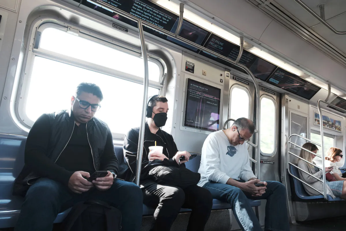 People, some still wearing face masks, ride a subway in Brooklyn in New York City, on May 11, 2023. (Spencer Platt/Getty Images)