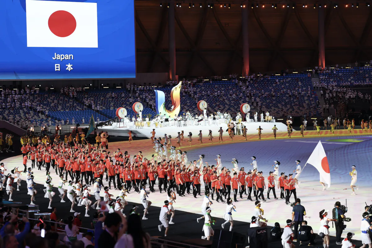 Members of Team Japan make their way around the stadium during the 2023 Summer Universiade Opening Ceremony at Dong'an Lake Sports Park Stadium in Chengdu, China on July 28, 2023. (Lintao Zhang/Getty Images)