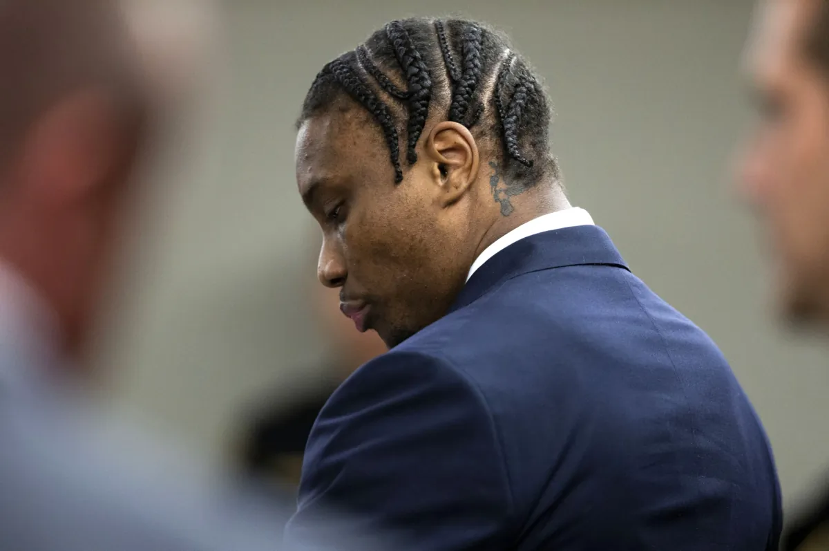 Former Las Vegas Raiders NFL football player Henry Ruggs III stands in the courtroom during his sentencing hearing at the Regional Justice Center in Las Vegas on Aug. 9, 2023. (Steve Marcus/Las Vegas Sun via AP)