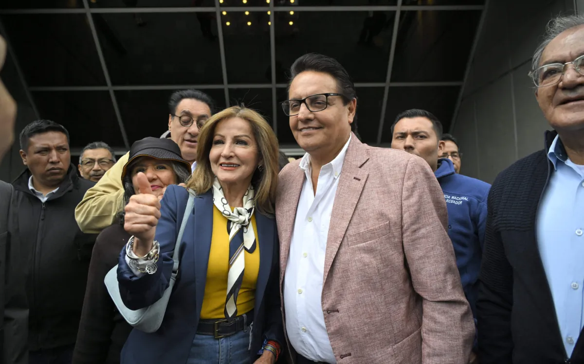 Former Assembly member and now presidential candidate, Fernando Villavicencio, greets supporters outside the Attorney General's Office in Quito on Aug. 8, 2023. (RODRIGO BUENDIA/AFP via Getty Images)