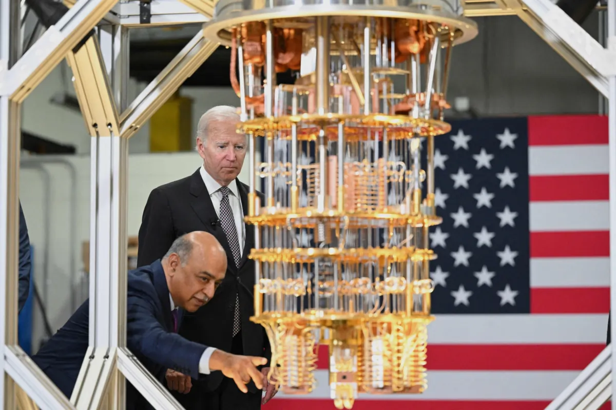 President Joe Biden listens to IBM CEO Arvind Krishna as he tours the IBM facility in Poughkeepsie, N.Y., on Oct. 6, 2022. (Mandel Ngan/AFP via Getty Images)