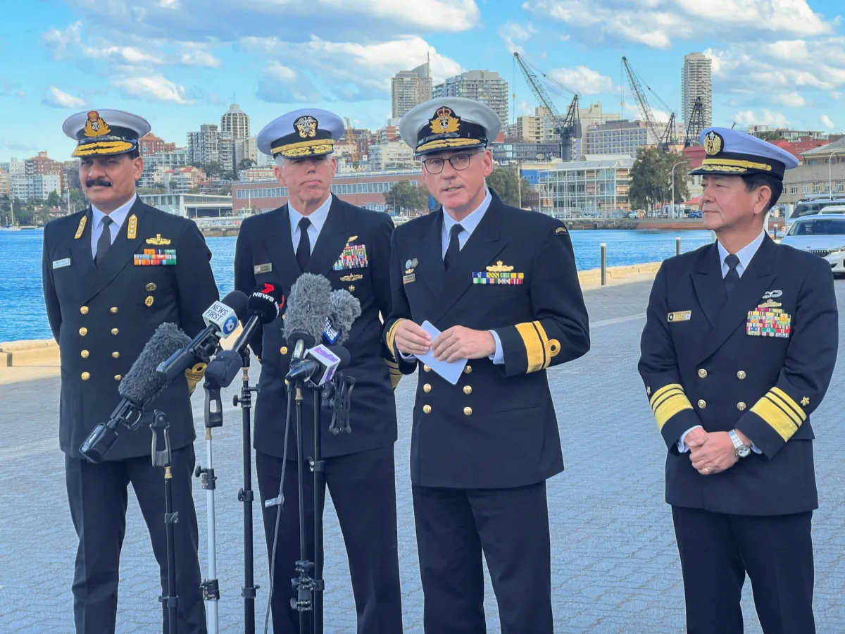 Vice admiral Saito Akira Commander in Chief of Japan Self Defense Fleet, Rear Admiral Christopher Smith, Commander Australian Fleet, Vice Admiral Dinesh Tripathi Commanding in Chief of India's Western Naval Command, and Vice Admiral Karl Thomas, Commander of the U.S. 7th Fleet attend to media in Sydney on Aug. 10, 2023. (Kirsty Needham/Reuters)