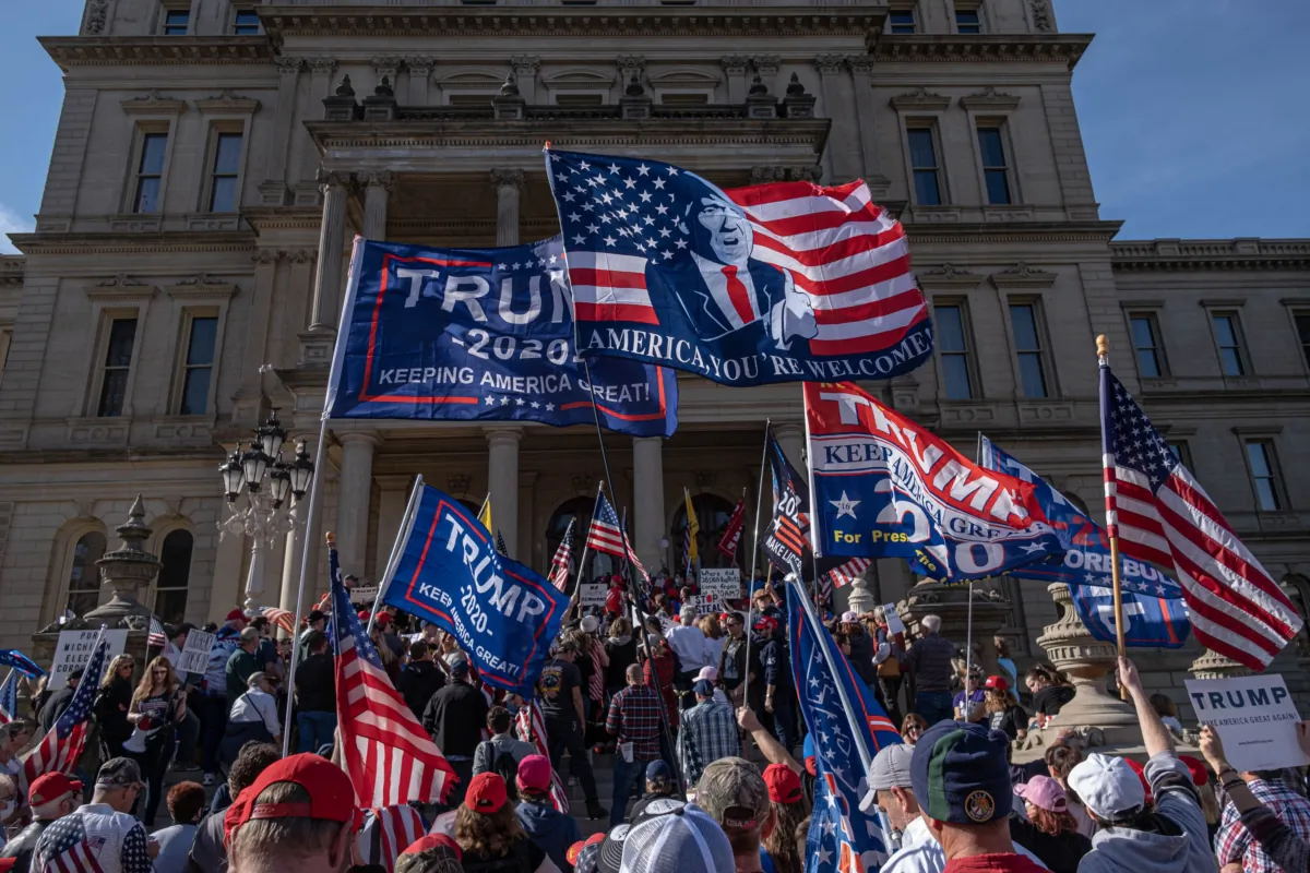 Supporters of President Donald Trump rally at the Michigan state Capitol in Lansing after Democratic Presidential nominee Joe Biden was declared the winner of the 2020 elections, on Nov. 7, 2020. (Seth Herald/AFP via Getty Images)
