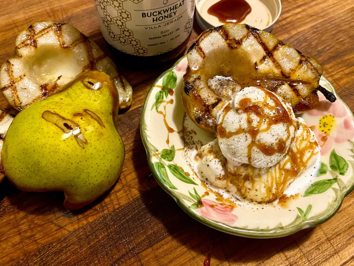 This summer's best easy dessert is grilled pears with ice cream, honey and black pepper. (Bethany Jean Clement/The Seattle Times/TNS)