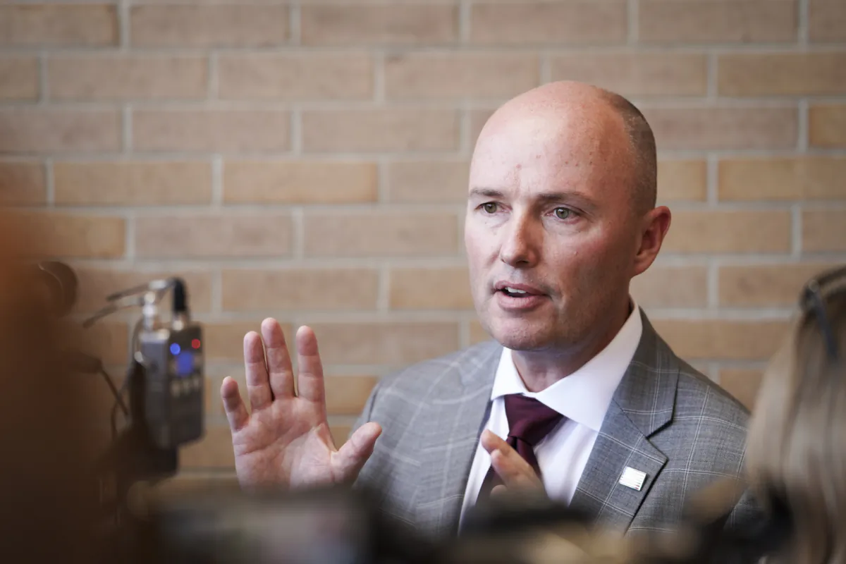 Utah Gov. Spencer Cox speaks with reporters after President Joe Biden’s speech marking the one-year anniversary of the Promise to Address Comprehensive Toxics (PACT) Act at the George E. Wahlen Department of Veterans Affairs Medical Center in Salt Lake City, Utah, on Aug. 10, 2023. (Madalina Vasiliu/The Epoch Times)