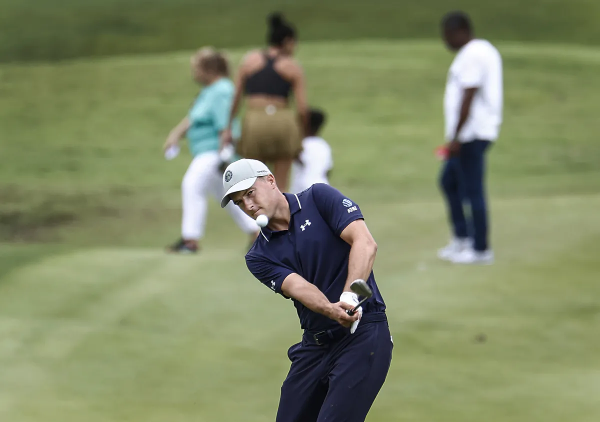 Jordan Spieth pitches on the 17th hole during the first round of the FedEx St. Jude Championship golf tournament at TPC Southwind in Memphis on Aug. 10, 2023. (Mark Weber/Daily Memphian via AP)