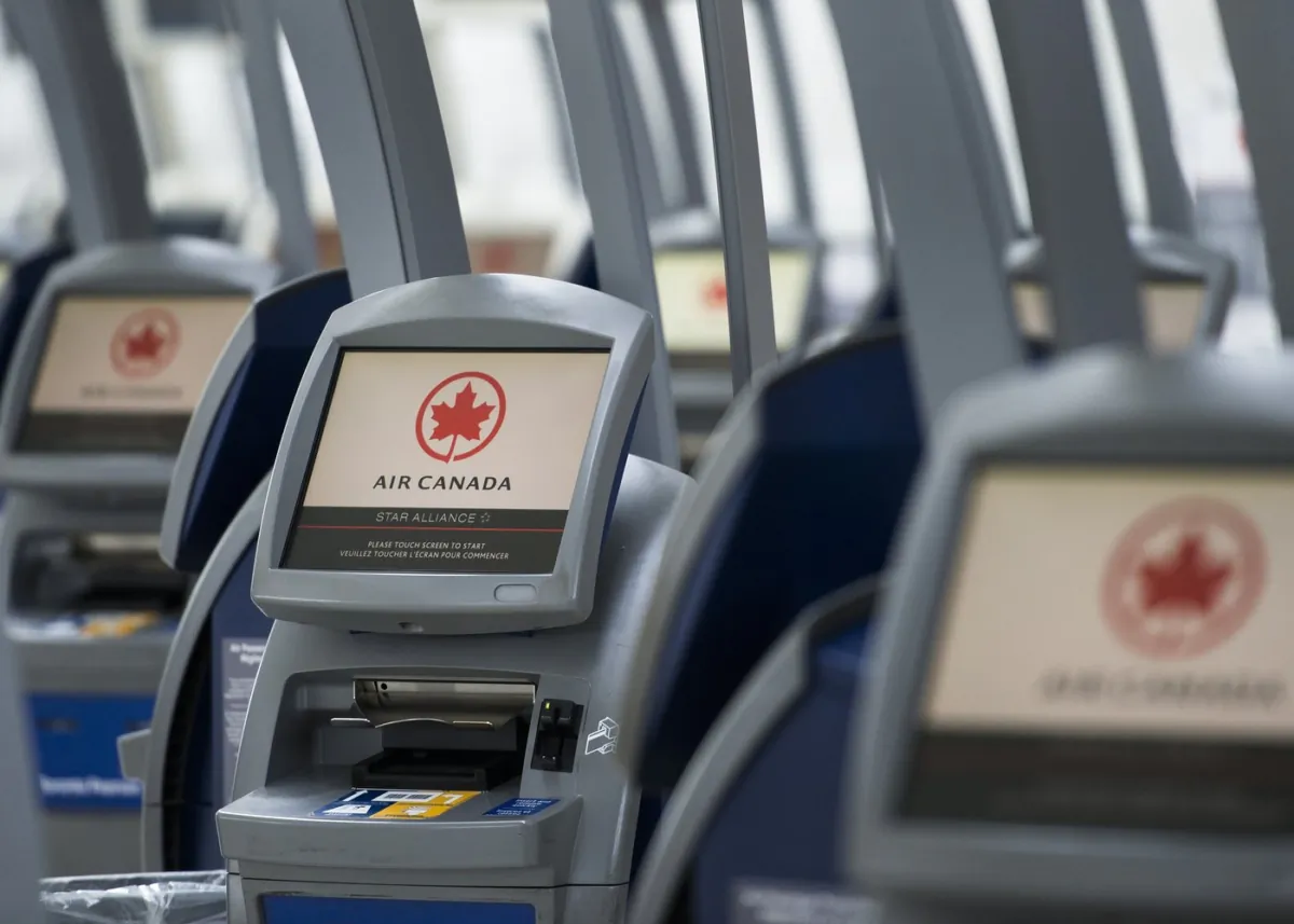 An Air Canada ticketing station is shown at Pearson International Airport in Toronto on April 8, 2020. (The Canadian Press/Nathan Denette)