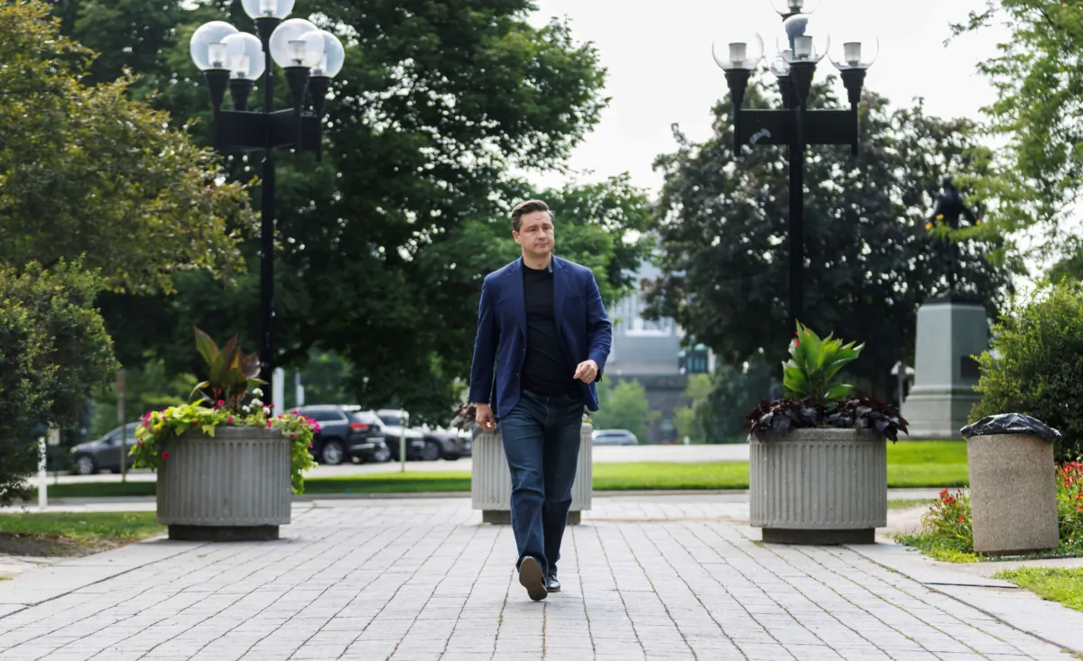 Conservative Leader Pierre Poilievre arrives to a media conference in Toronto on July 20, 2023.  (The Canadian Press/Cole Burston)