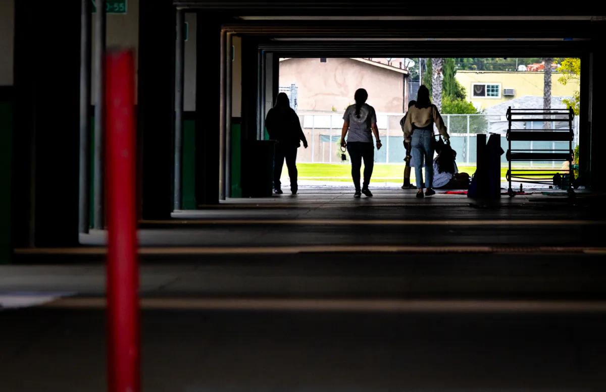 Staff and students walk through a hallway at Buena Park High School in Buena Park, Calif., on Aug. 11, 2023. (John Fredricks/The Epoch Times)
