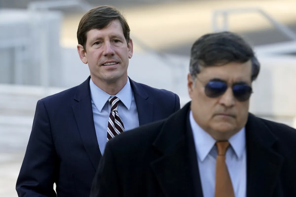 Former Republican state Sen. Brian Kelsey, left, arrives at federal court, in Nashville, Tenn., on Nov. 22, 2022. (AP Photo/Mark Humphrey, File)