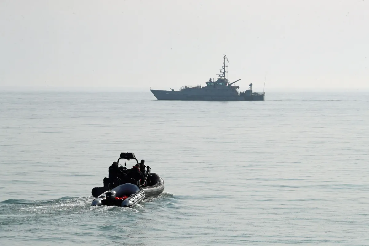 Undated file photo showing Border Force staff in the English Channel. (PA)