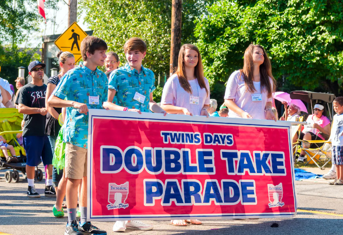 Twins march in the Double Take Parade during Twin Days in Twinsburg, Ohio. (Courtesy of Kenneth Sponsler/Dreamstime.com)