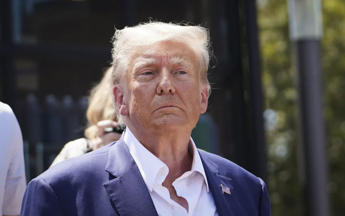 Former President Donald Trump leaves at the Iowa State Fair in Des Moines, Iowa, on Aug. 12, 2023. (Madalina Vasiliu/The Epoch Times)