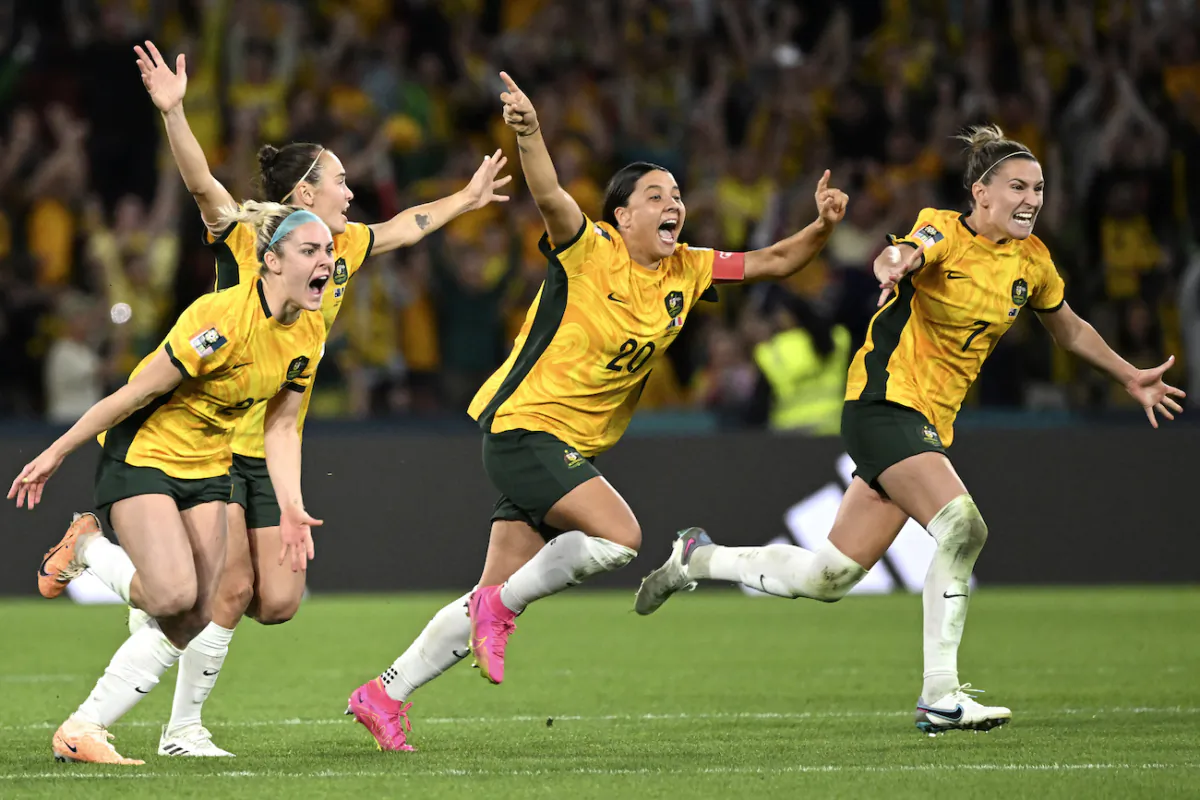 Australia's from left, Ellie Carpenter, Caitlin Foord, Sam Kerr and Steph Catley celebrate after Cortnee Vine kicked the winning penalty goal to defeat France in the Women's World Cup quarterfinal soccer match between Australia and France in Brisbane, Australia, on Aug.12, 2023. (Darren England/AAPImage via AP)