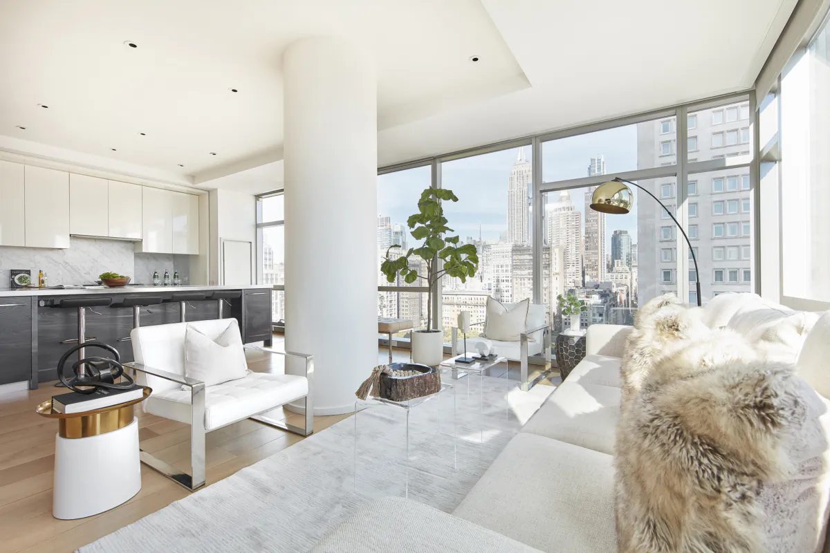 A white-on-white living room complements a bright space that is filled with light. (Scott Gabriel Morris/TNS)