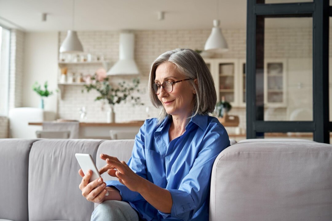 Many individuals spend hours staring at their phones every day, which could potentially harm their eyes and neck. (Shutterstock)