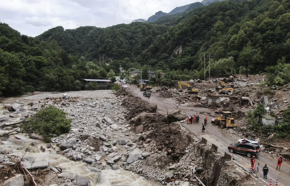 The aftermath of a mudslide in Weiziping village of Luanzhen township on the outskirts of Chang'an district, Xi'an of northwestern China's Shaanxi Province on Aug. 12, 2023. (Zou Jingyi/Xinhua via AP)