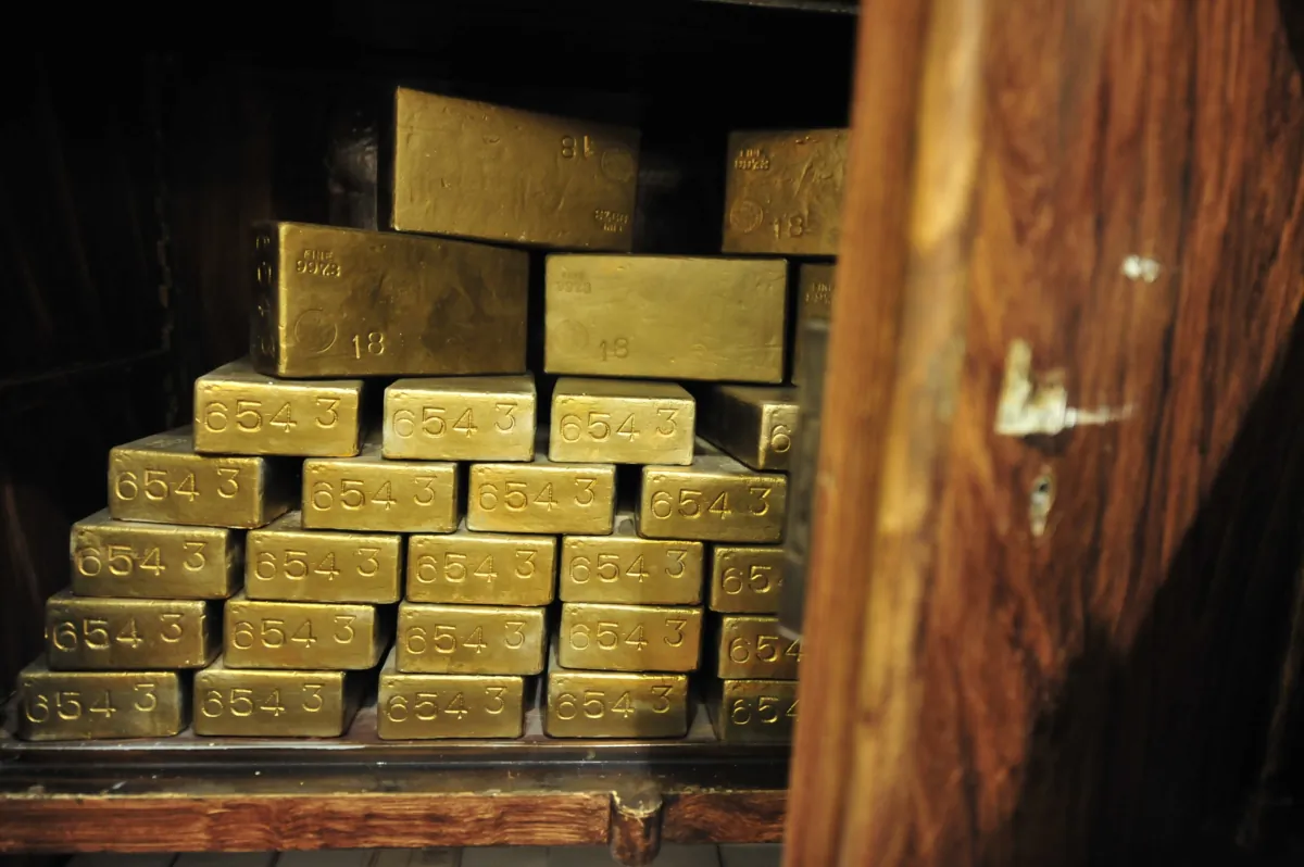 Gold ingots in an antique safe, about 100 years old, shown at the "History of Money" exhibition at the Hungarian National Bank in Budapest on Nov. 29, 2011. (Attila Kisbenedek /AFP via Getty Images)