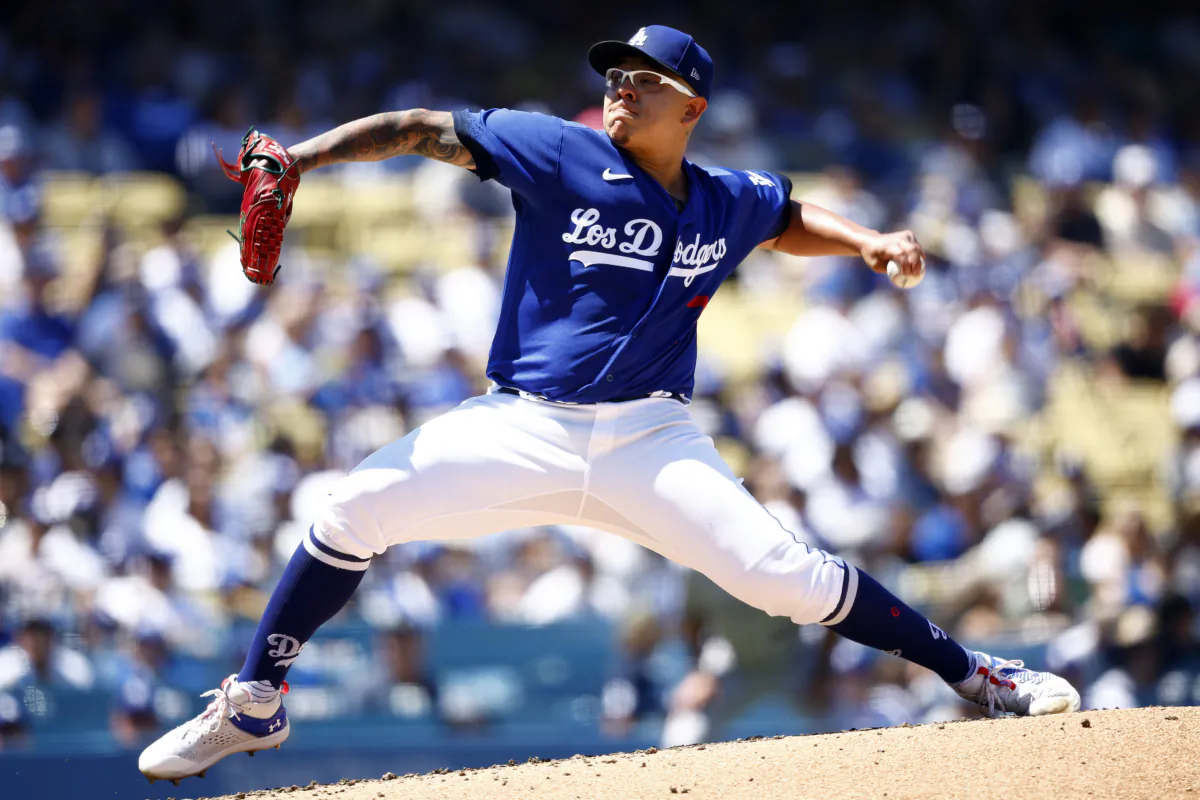 Julio Urias (7) of the Los Angeles Dodgers throws against the Colorado Rockies in the fourth inning at Dodger Stadium in Los Angeles on August 13, 2023. (Ronald Martinez/Getty Images)