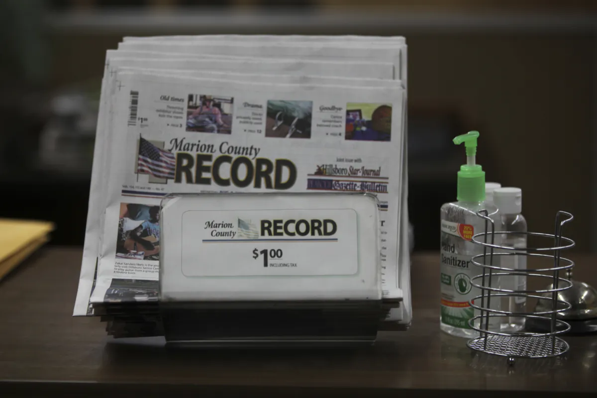 The last printed issue of the Marion County Record sits in a display in its office in Marion, Kan., on Aug. 13, 2023. (John Hanna/AP Photo)