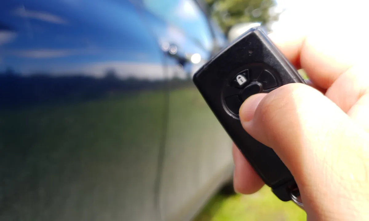 A motorist holds a keyless fob in this file photo. (Lily Zhou/The Epoch Times) 