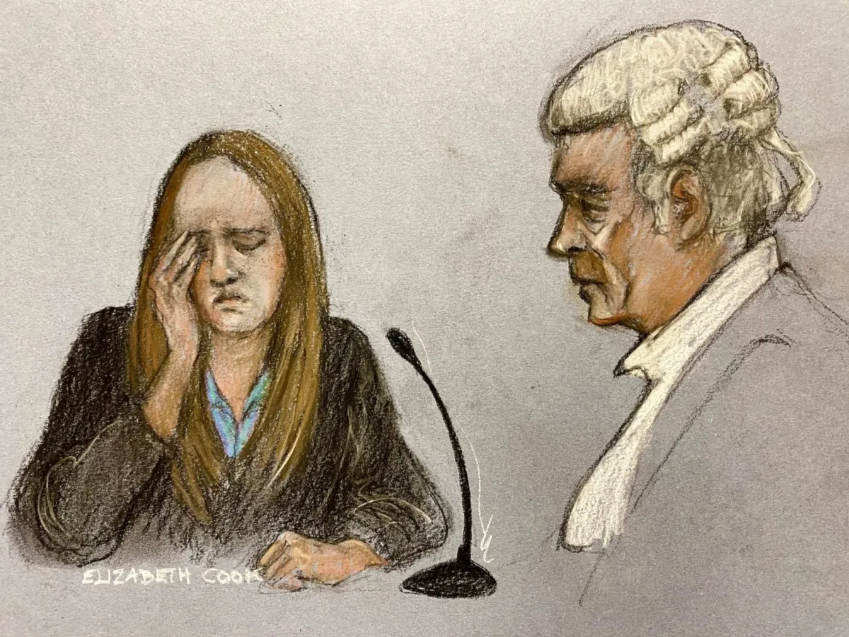 A courtroom sketch of Lucy Letby to a question from her barrister Ben Myers, KC at her trial at Manchester Crown Court in Manchester, England, on May 17, 2023. (PA)