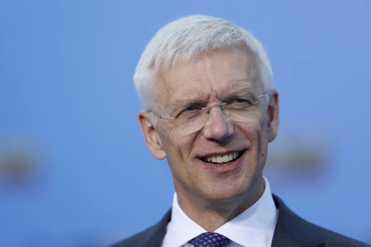 Latvia's Prime Minister Krisjanis Karins speaks with the media as he arrives for a NATO summit in Vilnius, Lithuania, on July 12, 2023. (Mindaugas Kulbis/AP Photo)