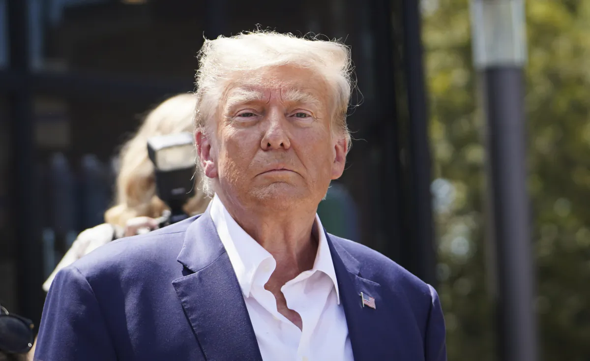 Former President Donald Trump leaves the Iowa State Fair in Des Moines, Iowa, on Aug. 12, 2023. (Madalina Vasiliu/The Epoch Times)