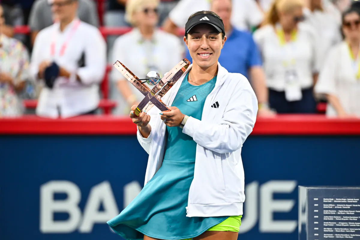 Jessica Pegula of the United States of America holds up the National Bank Open trophy after her victory against Liudmila Samsonova in the final round on Day 7 during the National Bank Open at Stade IGA in Montreal on August 13, 2023. (Minas Panagiotakis/Getty Images)