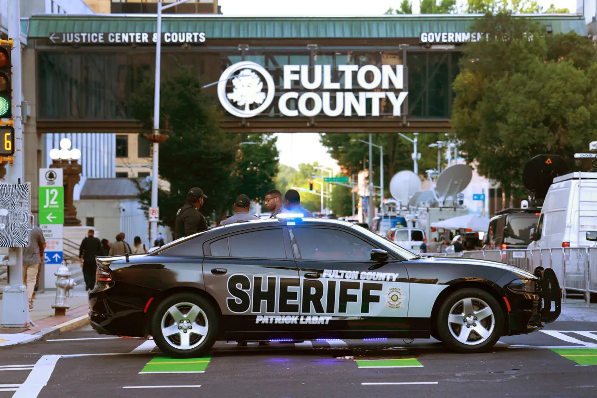 Fulton County Sheriff officers block off a street in front of the Fulton County Courthouse in Atlanta, Ga., on Aug.14, 2023. (Joe Raedle/Getty Images)