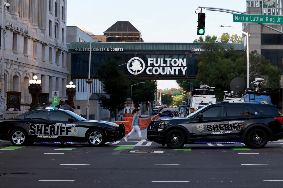 Fulton County Sheriff officers block off a street in front of the Fulton County Courthouse in Atlanta, Ga., on Aug. 14, 2023. (Joe Raedle/Getty Images)