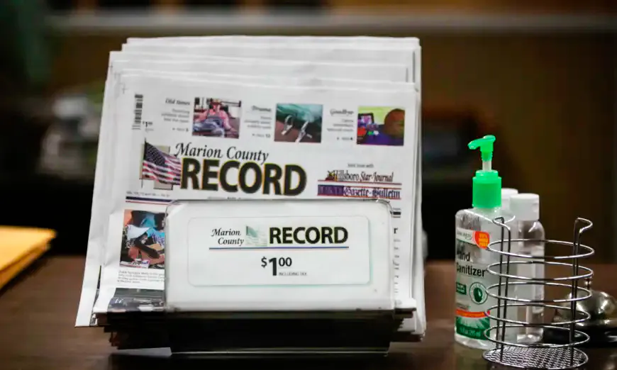 The last printed issue of the Marion County Record sits in a display in its office in Marion, Kan., on Aug. 13, 2023. (John Hanna/AP Photo)