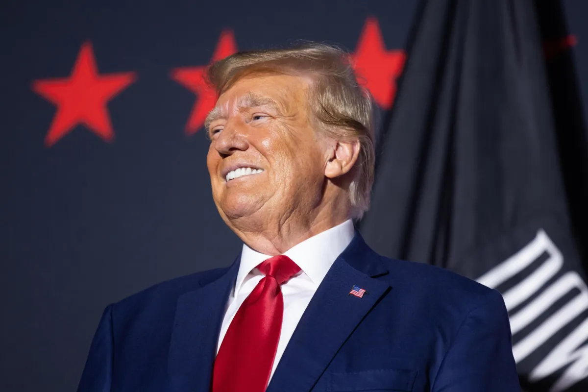 Former President Donald Trump waits onstage before delivering remarks at Windham High School in Windham, N.H., on Aug. 8, 2023. (Scott Eisen/Getty Images)