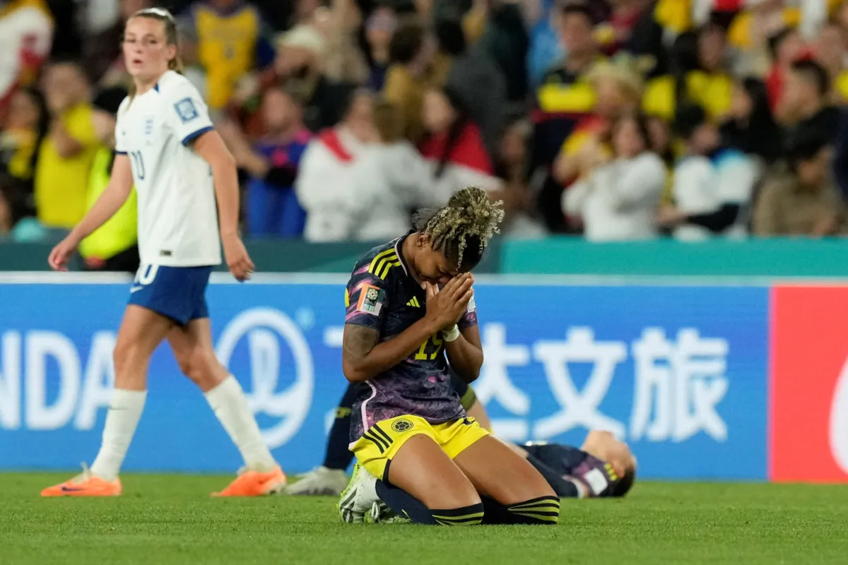 Colombia's Jorelyn Carabali gets on her knees after losing the Women's World Cup quarterfinal soccer match between England and Colombia at Stadium Australia in Sydney on Aug. 12, 2023. (Mark Baker/AP Photo)