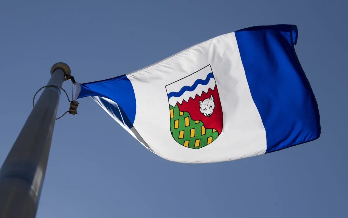 The Northwest Territories provincial flag flies on a flag pole in Ottawa, on July 6, 2020. (The Canadian Press/Adrian Wyld)