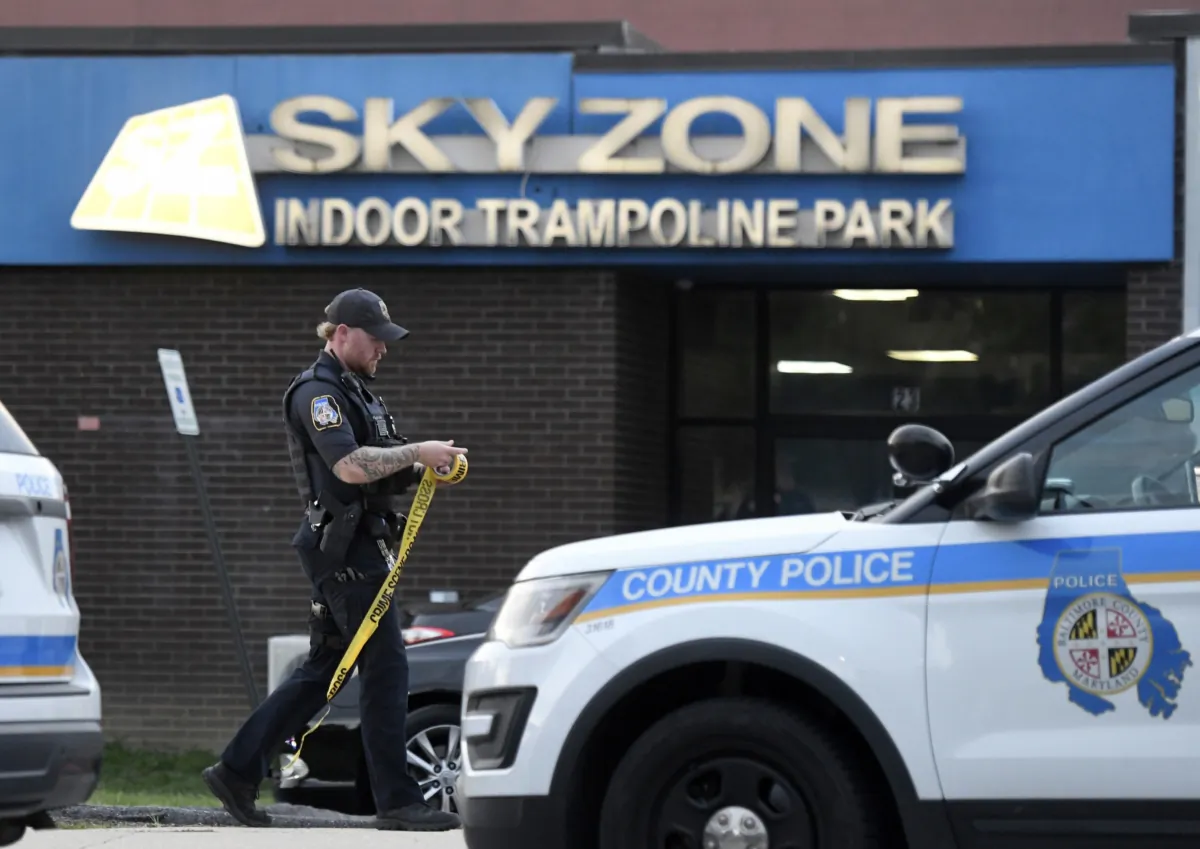 A Baltimore County police officer works outside a Sky Zone trampoline park in Timonium, Md., on Aug. 12, 2023. (Steve Ruark/AP Photo)
